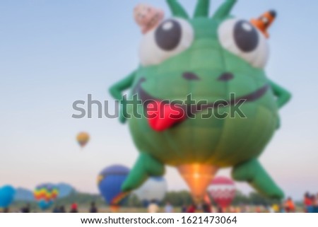 Blurred Picture The Colourful of Hot Air Balloon Make Prepare for Landing with Sunset Sky.