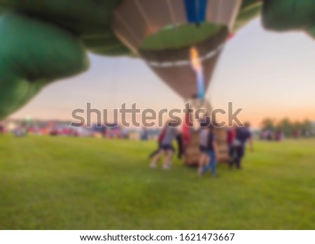 Blurred Picture The Colourful of Hot Air Balloon Make Prepare for Landing with Sunset Sky.