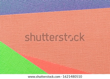 Abstract colorful paper background. Paper texture close up. Flat lay, top view, copy space
