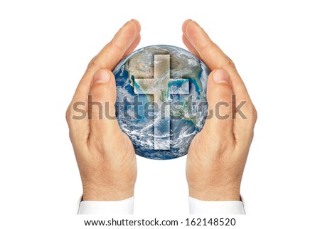 Hands holding the planet Earth with the Christian cross ."Elements of this image furnished by NASA"