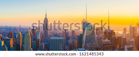 Panoramic Manhattan skyline at sunset. New York City