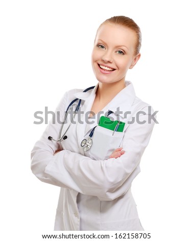 Portrait of happy young doctor woman standing with arms crossed isolated on white background