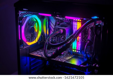 Gaming PC with RGB LED lights on a computer, assembled with hardware components Royalty-Free Stock Photo #1621672105