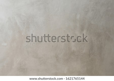 Abstract textured cement concrete gray background and wallpaper.Gray blank concrete cement textured background and wallpaper for text and photo. Polished polished cement surface for a background.