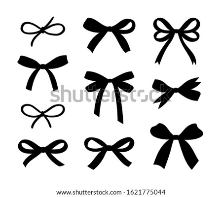Big hand drawn doodle decorative bows and ribbons isolated on white background. Black silhouette set for hair decoration, celebration party items, gift packaging, present cards and luxury wrap pack