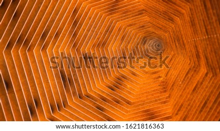 A pattern of geometrical shapes especially in octagon which creates lines and illusions in the orange and black colour, looking futuristic Royalty-Free Stock Photo #1621816363