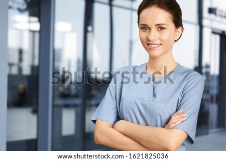 Man doctor with a black stethoscope on bokeh background