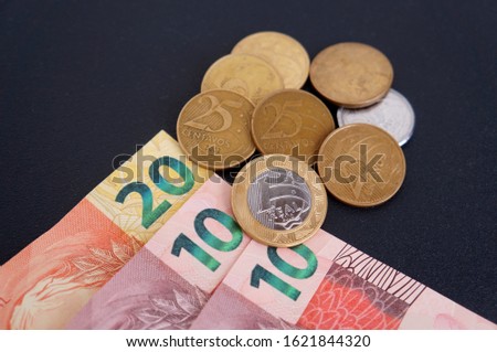 Brazilian Real banknotes and coins. Economy concept. Brazilian money. 