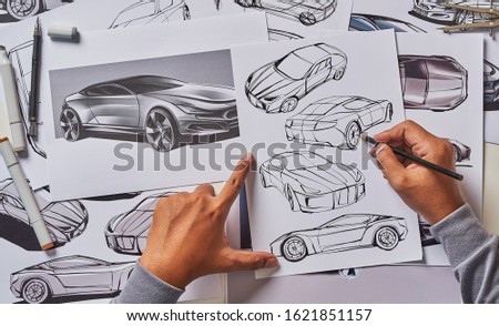 Designer engineer automotive design drawing sketch development Prototype concept car industrial creative.                               