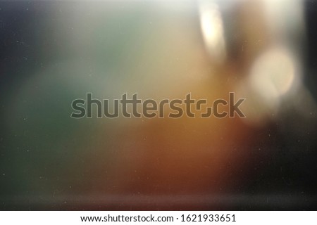 Colorful grunge background. Old noise texture. Analog photo effect.  00s mask. redacted. Foto film effect.  Lens flare and heavy grain. 70s Royalty-Free Stock Photo #1621933651