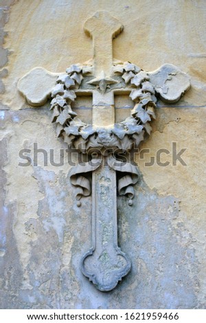 Cross and chaplet on the wall