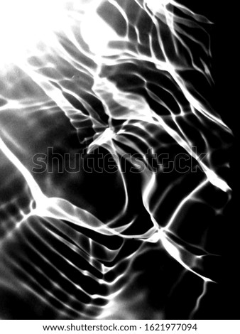 Abstract of surface​ black​ water​ for background. Pattern​ of blue ​water​ for background. The metal​ texture​ of black water​ for​ background​