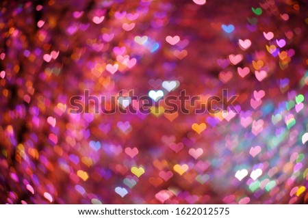 Bright multi-colored hearts bokeh lights. Beautiful valentines day background