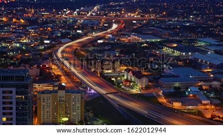 An aerial of San Antonio, Texas expressways at night