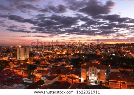 Sao Carlos, SP, Brazil – Top view of the west side of the city at sunset. View of a Neighboorhood called "Cidade Jardim". Royalty-Free Stock Photo #1622021911
