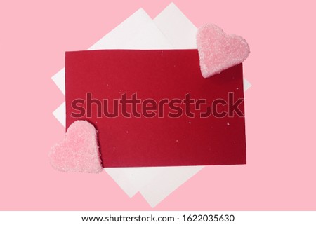 Sweet hearts on a red background. Gift card, certificate, place for text, free space. Valentine's Day.