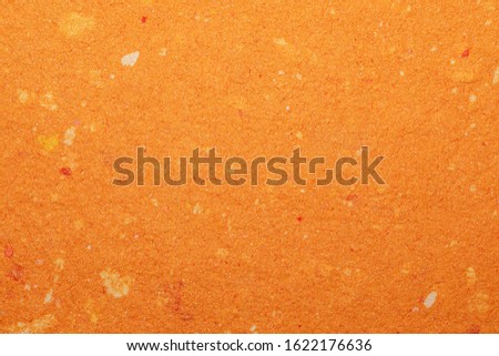 detail paper structure. orange paper background. clean paper.