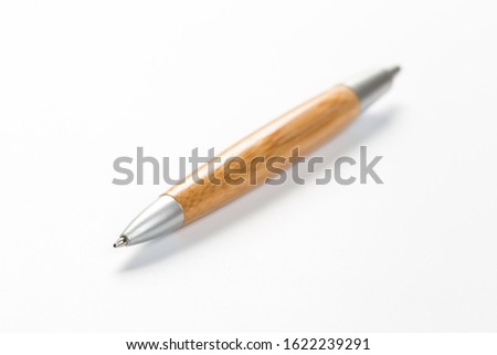 ballpoint pen isolated on a white background. Nice pen mockup for corporate business identity presentation.