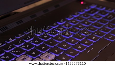 A computer keyboard is a typewriter-style device which uses an arrangement of buttons or keys to act as mechanical levers or electronic switches. Royalty-Free Stock Photo #1622273110