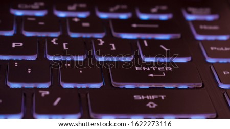 A computer keyboard is a typewriter-style device which uses an arrangement of buttons or keys to act as mechanical levers or electronic switches. Royalty-Free Stock Photo #1622273116