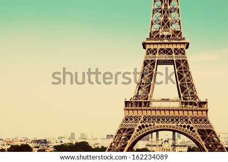 Eiffel Tower middle section, the city in the background, Paris, France. Vintage, retro style Royalty-Free Stock Photo #162234089