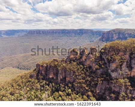 Panoramic Blue Mountains Australia. DRONE. Dramatic views of peaks, rock, valley, landscape, green rainforest jungle. Adventure, freedom, fun concepts. Tourist mountain trek. Shot in Sydney, NSW.