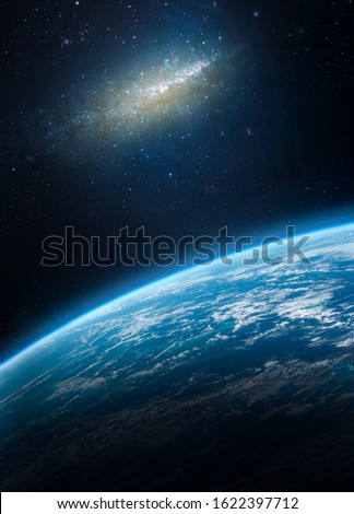 Planet Earth in dark outer space. Nebula and gaalxy. Milky way. Elements of this image furnished by NASA