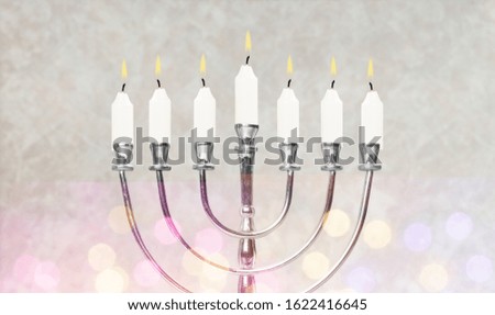 Religion jewish holiday Hanukkah with menorah, candelabra and oil candles