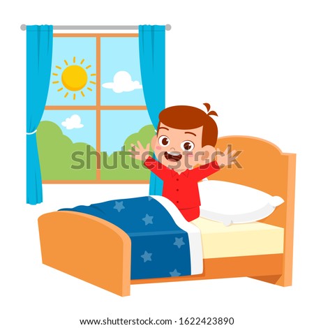 happy cute little kid boy wake up in the morning Royalty-Free Stock Photo #1622423890