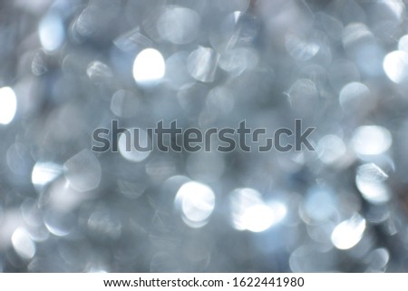 pictured silver background with bokeh