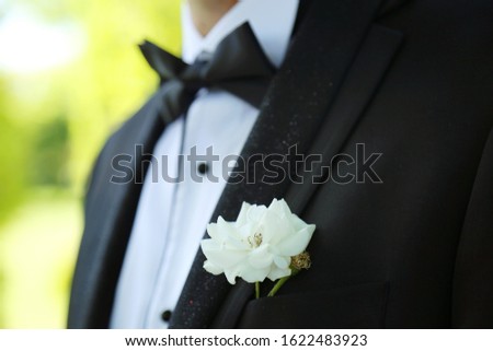 groom's pocket flower and bowtie