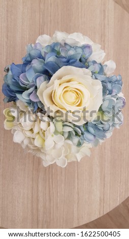 Artificial flower on the table