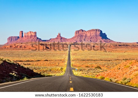 Scenic Road leading to Monument Valley Royalty-Free Stock Photo #1622530183