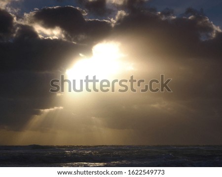 Sunrise Cloud Burst Over Rough Sea