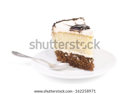 Beautiful tasty  cake on a white plate over white background