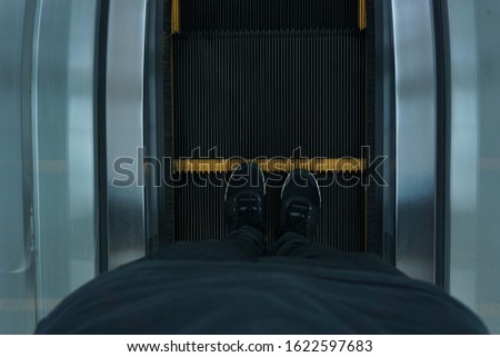 on the way at escalator