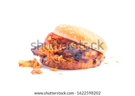 A picture of melted cheesy bbq grilled chicken burger on white background.