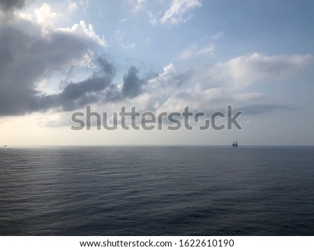  view of offshore living quarter platform or Offshore rig blue sky or Offshore oil and gas Accommodation Platform or Living Quarter and Production plant under a nice weather with supply boats