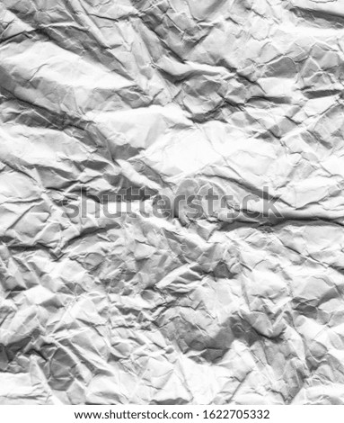 Crumpled white paper as abstract background.