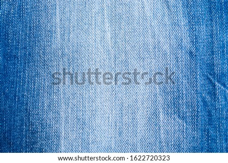 Classic blue, indigo, navy blue color jeans texture background