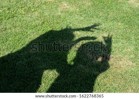 Shadow of a child Kid little and mom Play from hand