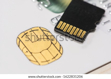 Micro SD memory card on Bank cards close-up, shallow depth of field