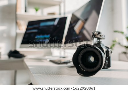 selective focus of digital camera near computer monitors