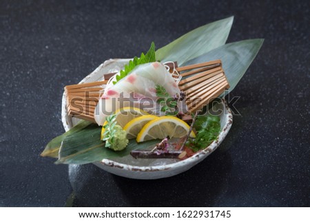 Madai sashimi or red snapper fish Japanese food cuisine isolated  Royalty-Free Stock Photo #1622931745