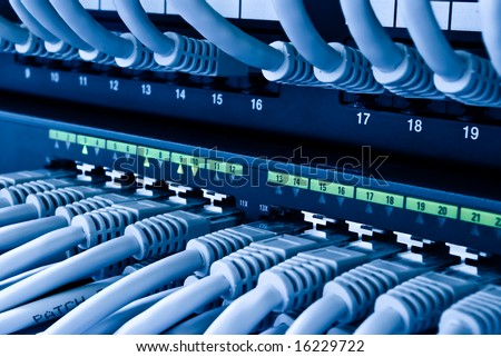 network hub and patch cables Royalty-Free Stock Photo #16229722