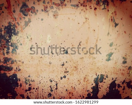 Rusty​ on the​ wall​ metal​ texture for background. The pattern​ of​ grunge​d rust​ on​ the  wall​ use​ for​ background. Red rust​ on the​ surface​ wall​ steel​