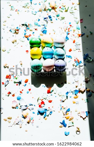 Box with  colored eggs, easter conceptual image,  hard natural direct light