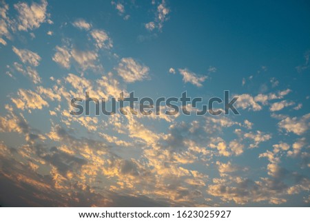 Blue sky with clouds and sunset