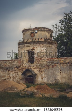 The ruins of the medieval castle. Repair of the tower. Ukraine