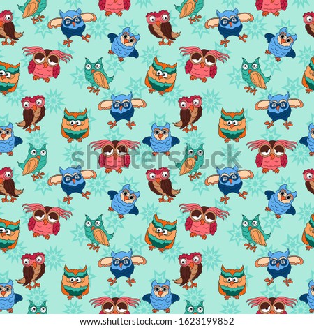 Seamless texture with colorful cartoon funny owls for baby decoration on the muted blue pattern background 
